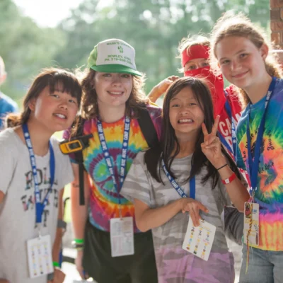 Campers and counselors pose for the camera at Camp Rise Above