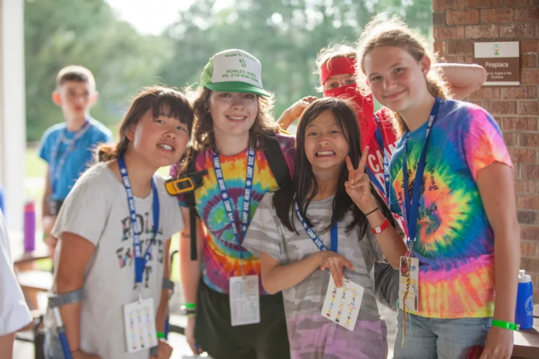 Campers and counselors pose for the camera at Camp Rise Above