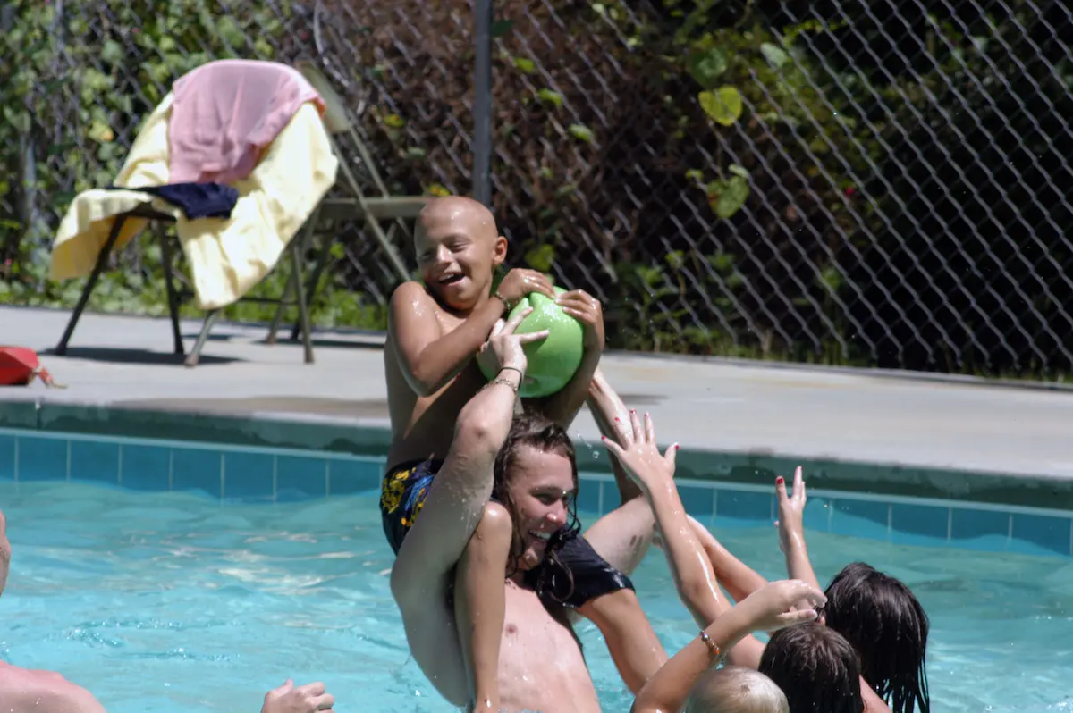 Cole Sawyer playing in the pool
