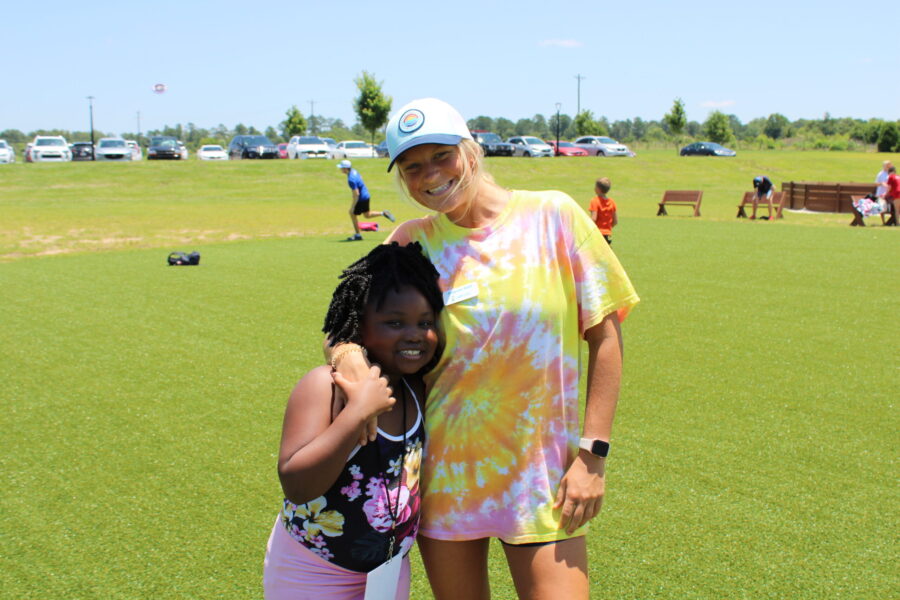 Camper and Counselor at Camp Impact